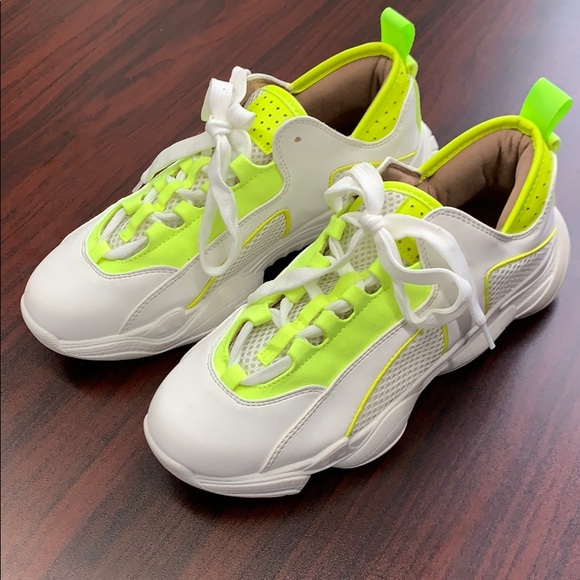 white and lime green sneakers